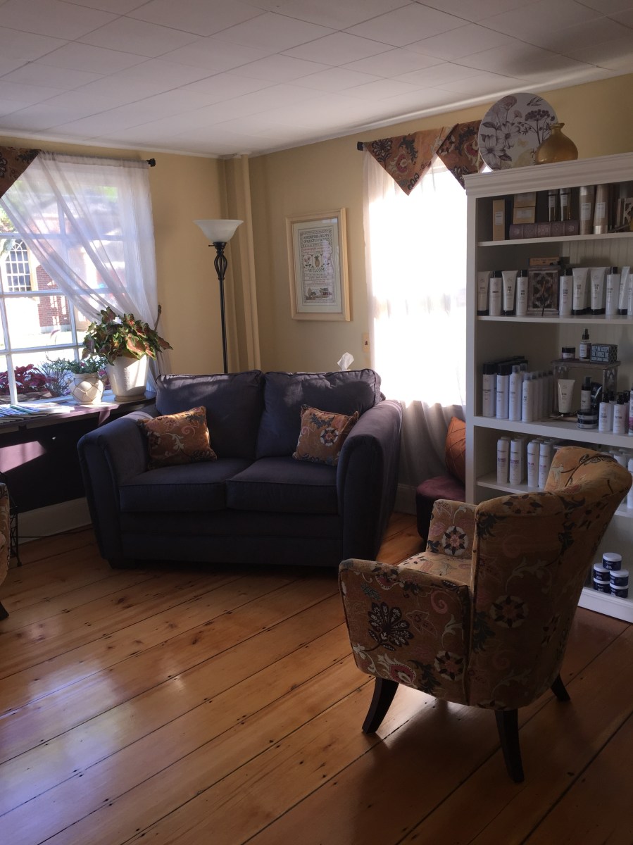 waiting area with couch and chair